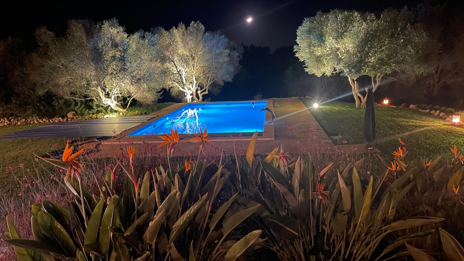 The pool lit at night