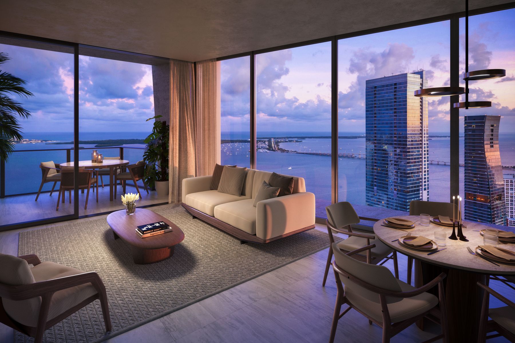 Living and dining room with bay views